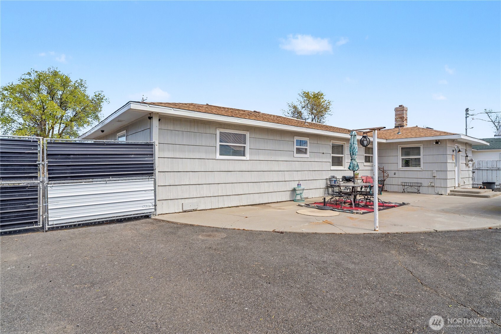1104 East Dobson Road Odessa, WA 99159 - Photo 18 of 40 a view of a house with a yard and garage