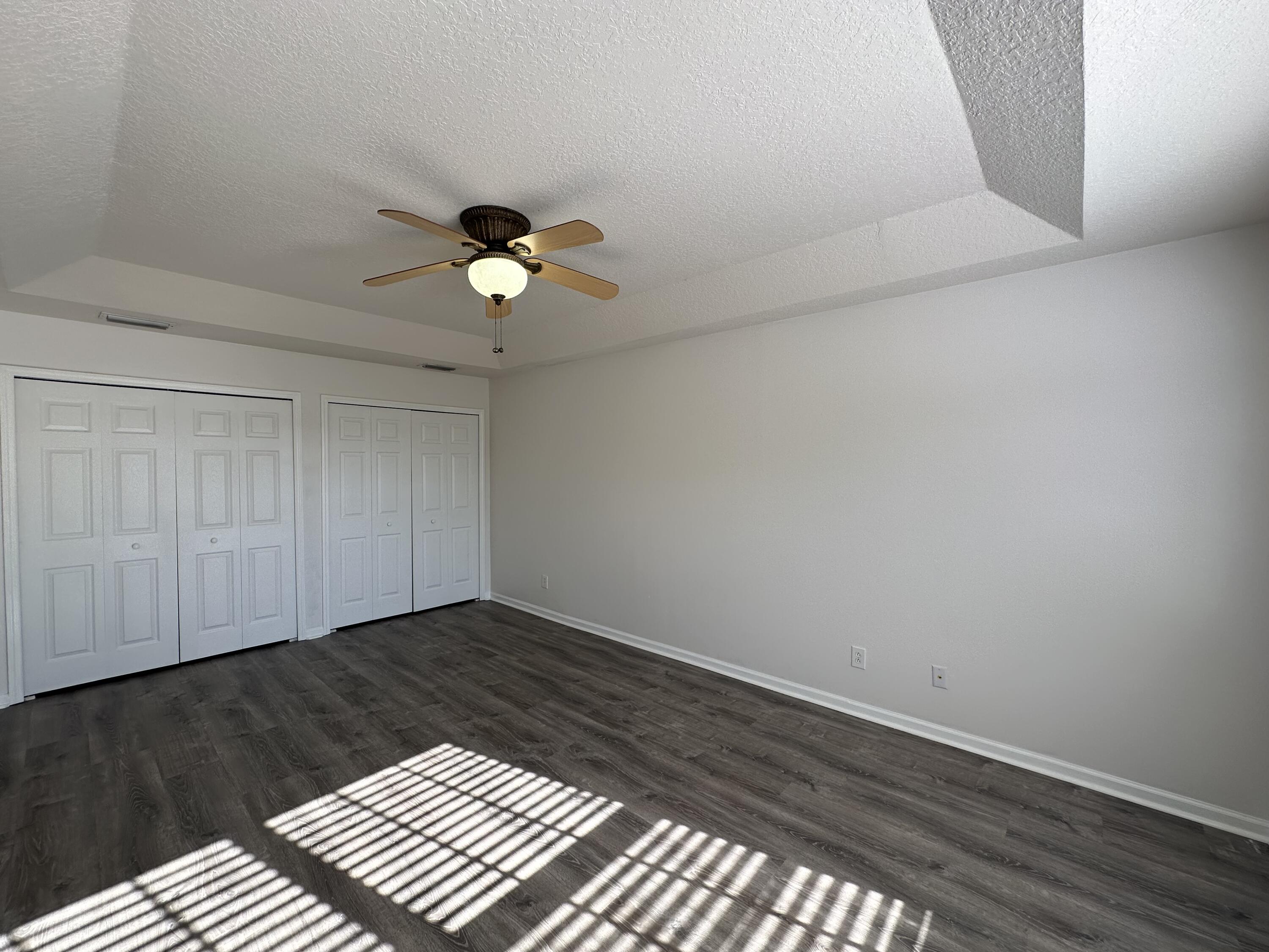 910 Luminary Circle, Unit 103 Melbourne, FL 32901 - Photo 18 of 31 Master Bedroom