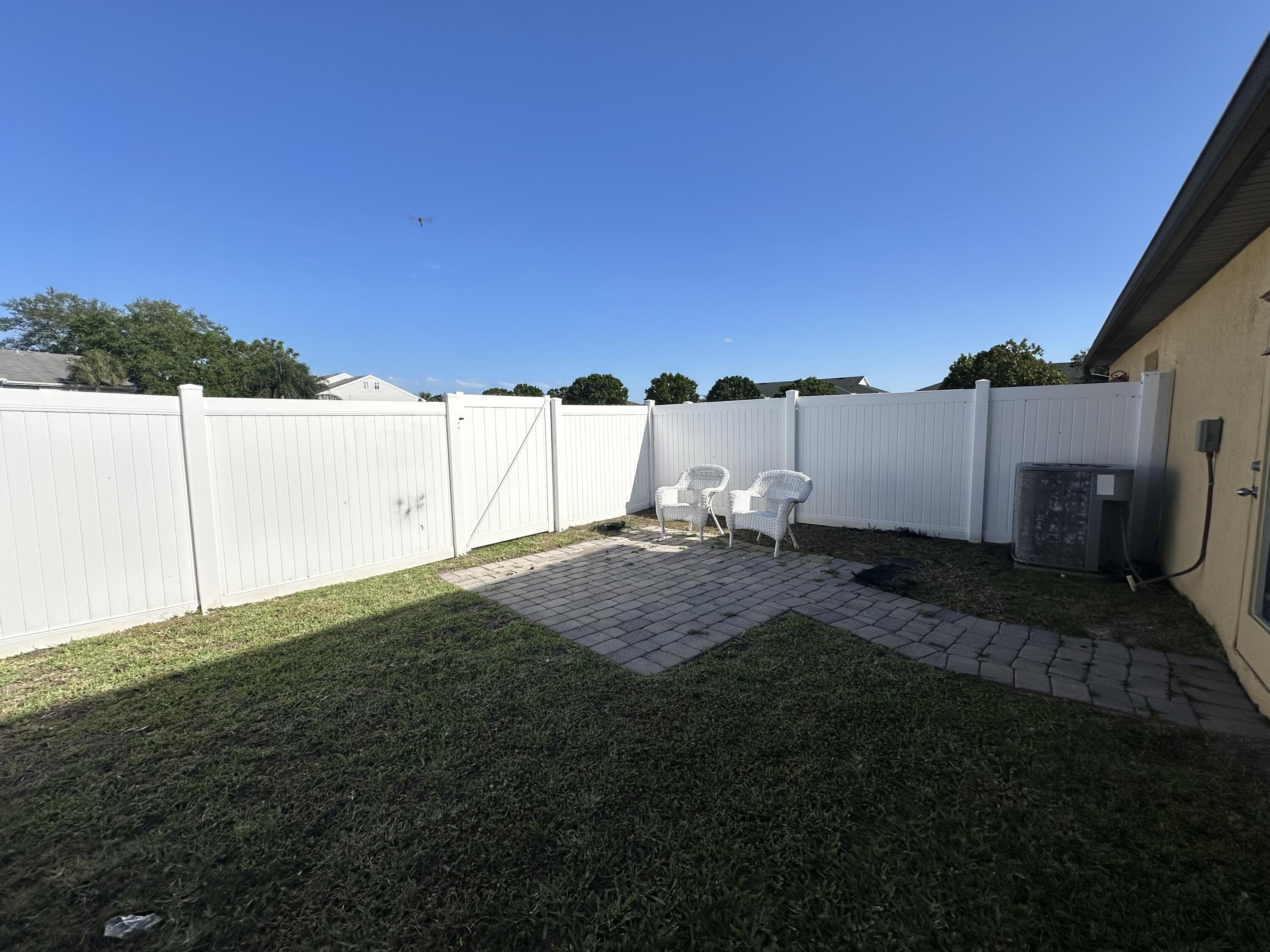 910 Luminary Circle, Unit 103 Melbourne, FL 32901 - Photo 23 of 31 a view of a backyard
