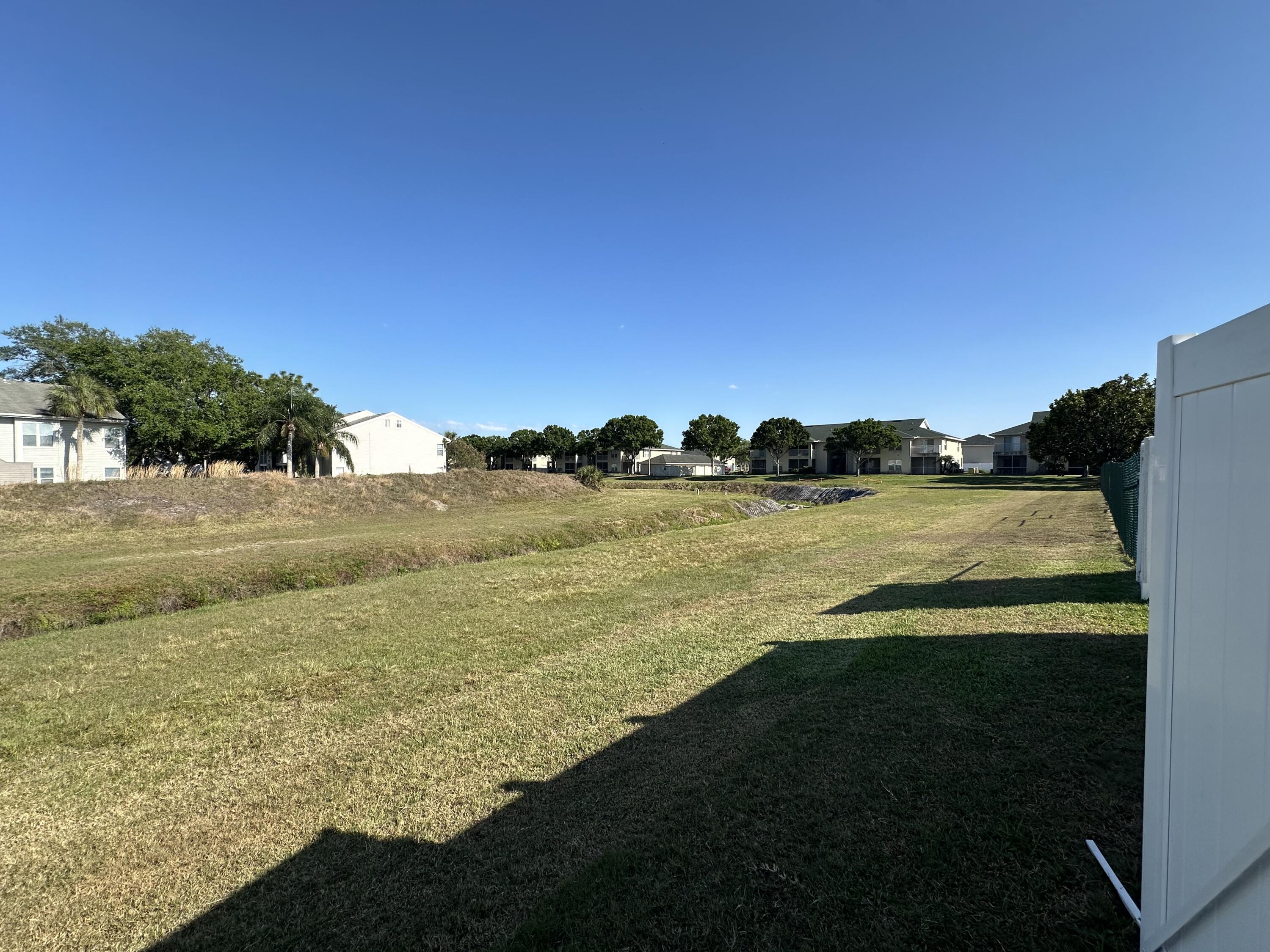 910 Luminary Circle, Unit 103 Melbourne, FL 32901 - Photo 27 of 31 a view of an ocean from a balcony