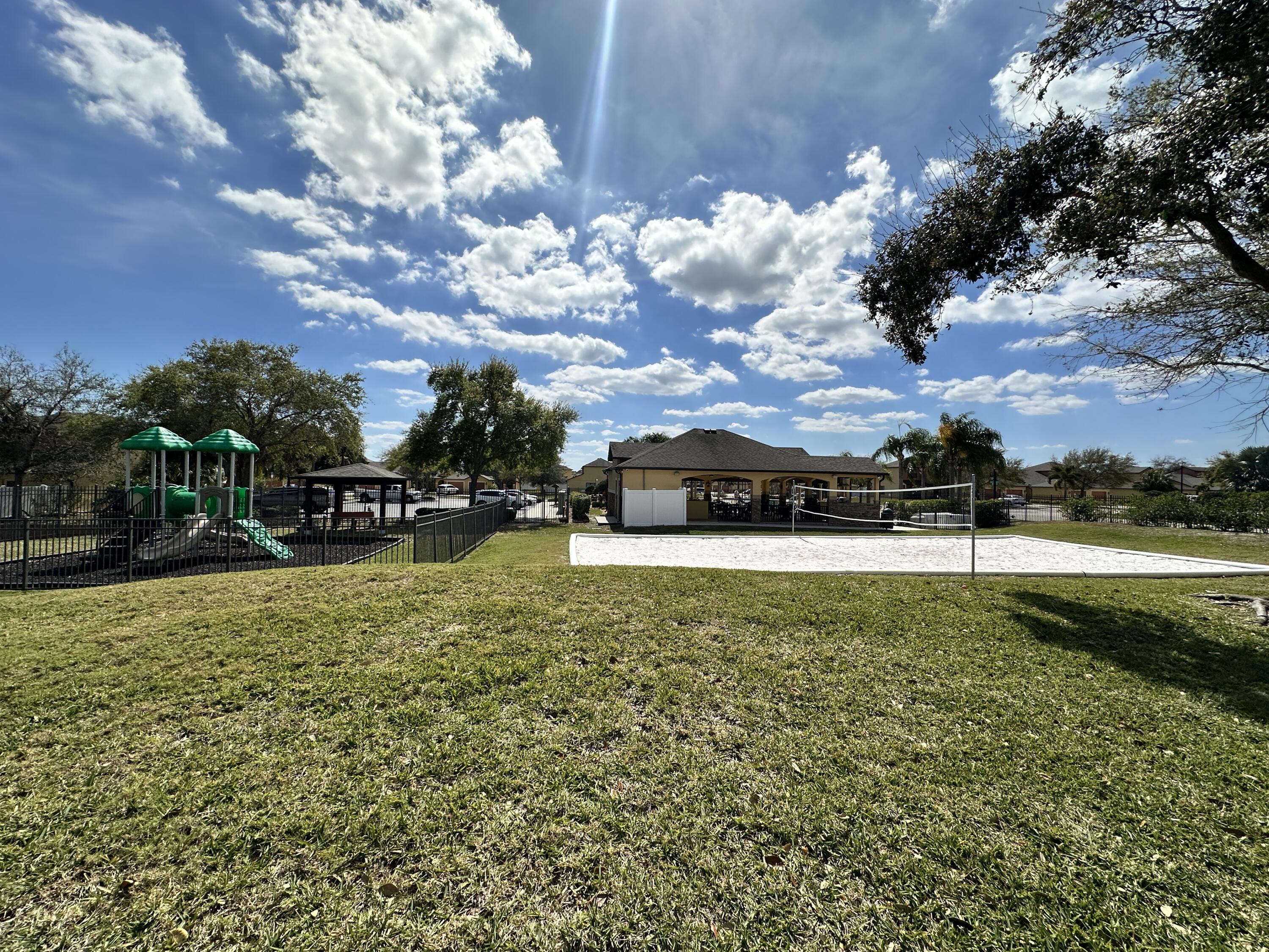 910 Luminary Circle, Unit 103 Melbourne, FL 32901 - Photo 31 of 31 Playground/Volleyball Area