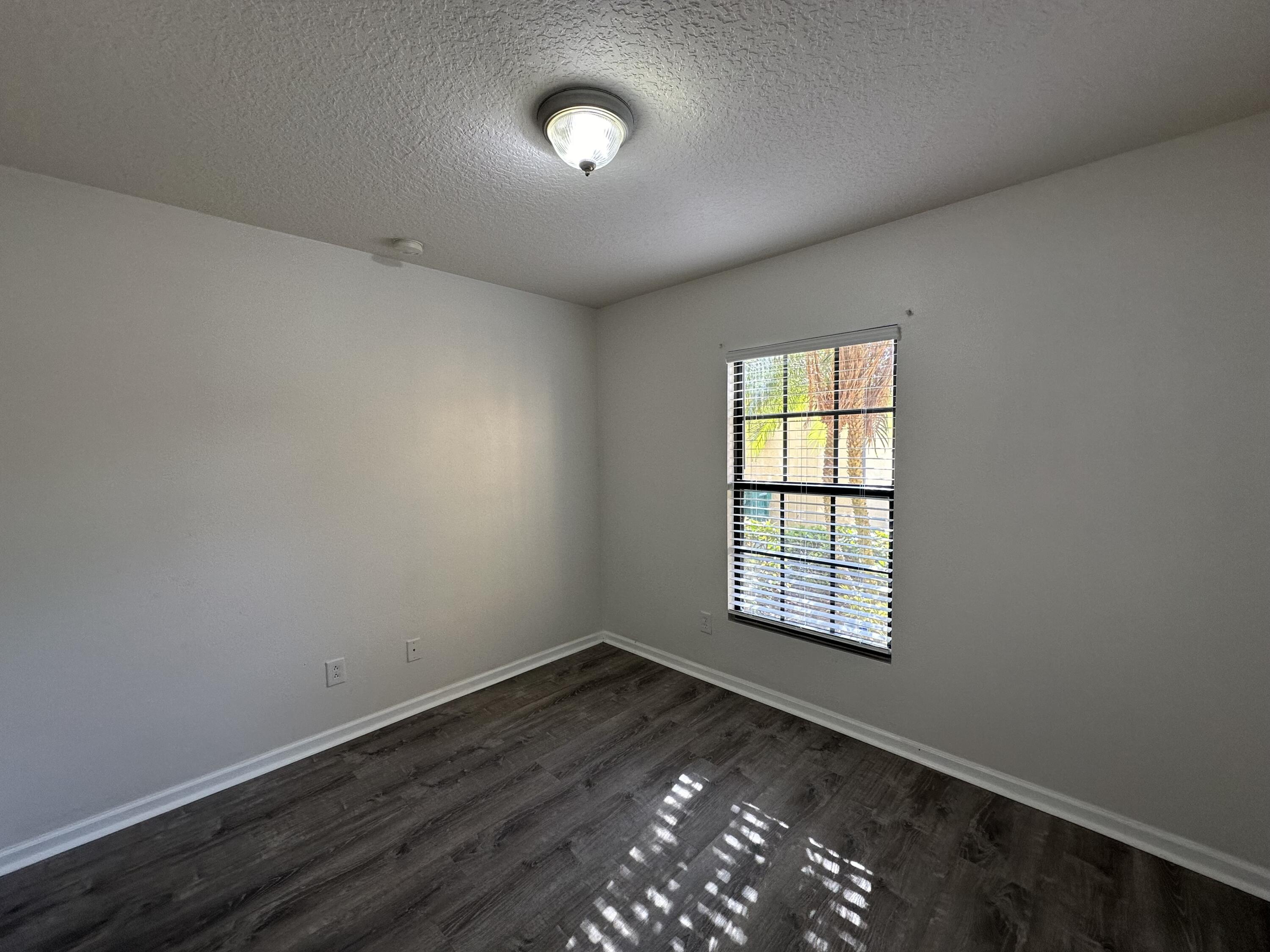 910 Luminary Circle, Unit 103 Melbourne, FL 32901 - Photo 9 of 31 Front Bedroom