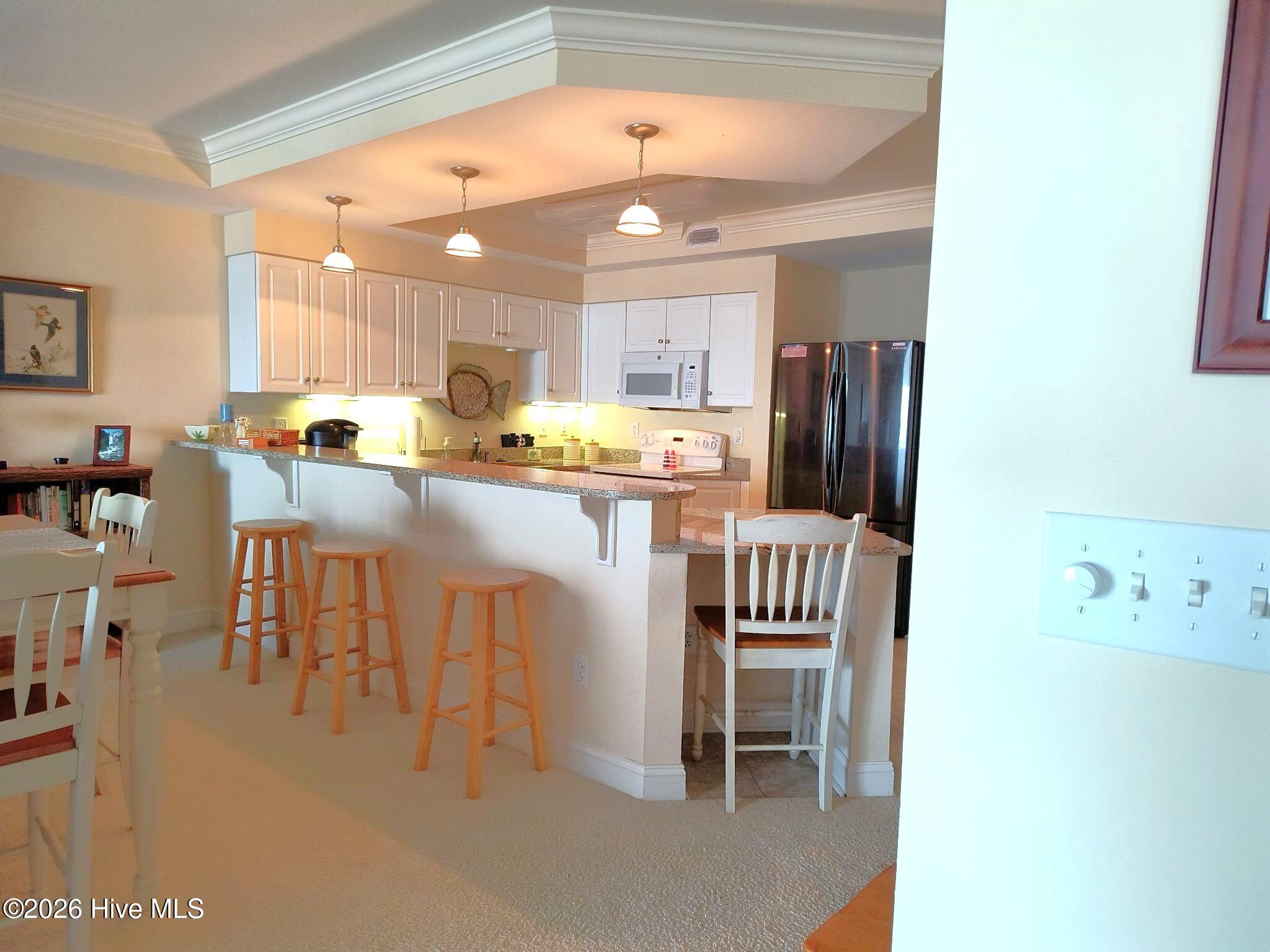 1550 Salter Path Road, Unit 209 Indian Beach, NC 28512 - Photo 9 of 31 kitchen view 1