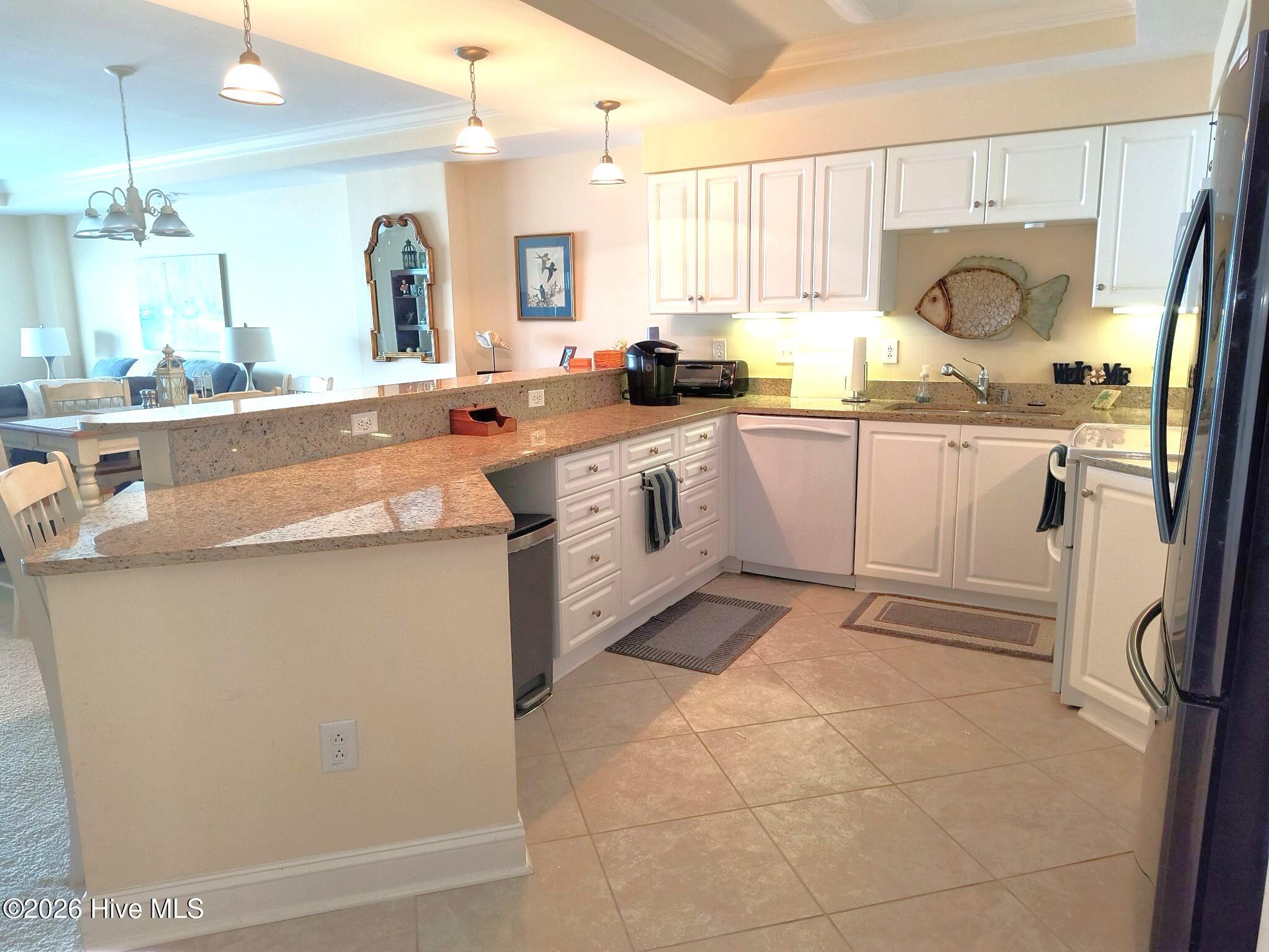 1550 Salter Path Road, Unit 209 Indian Beach, NC 28512 - Photo 10 of 31 kitchen view 2