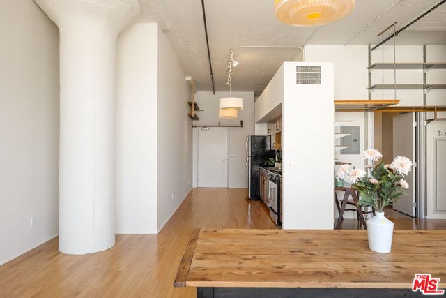a view of a living room with a potted plant