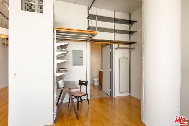 a view of a room with a table and chair
