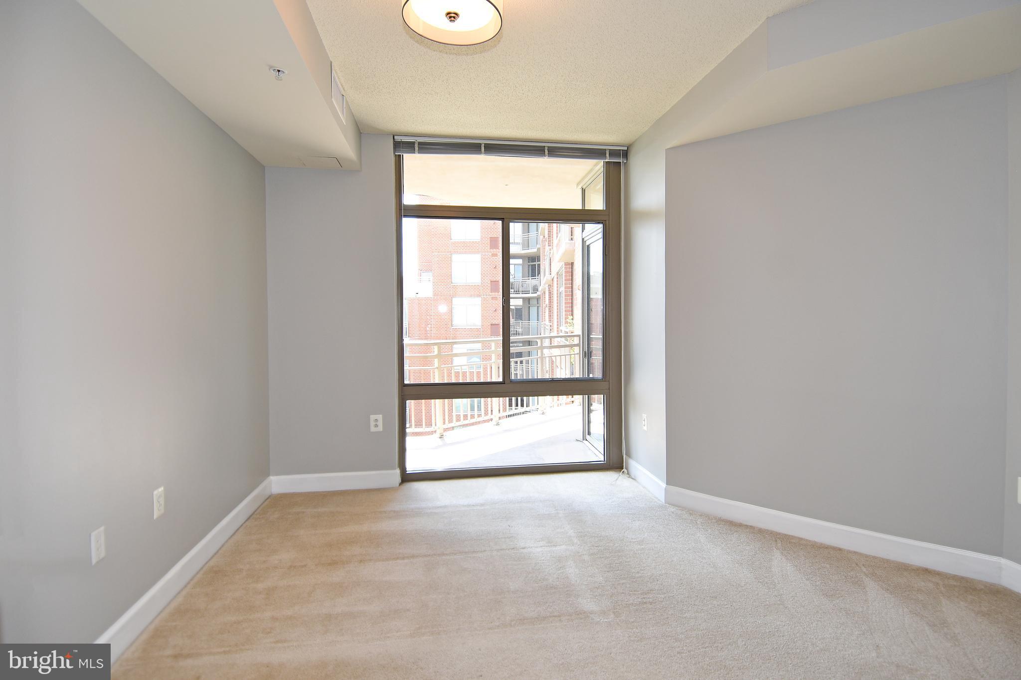 3650 South Glebe Road, Unit 662 Arlington, VA 22202 - Photo 31 of 63 a view of an empty room with a window
