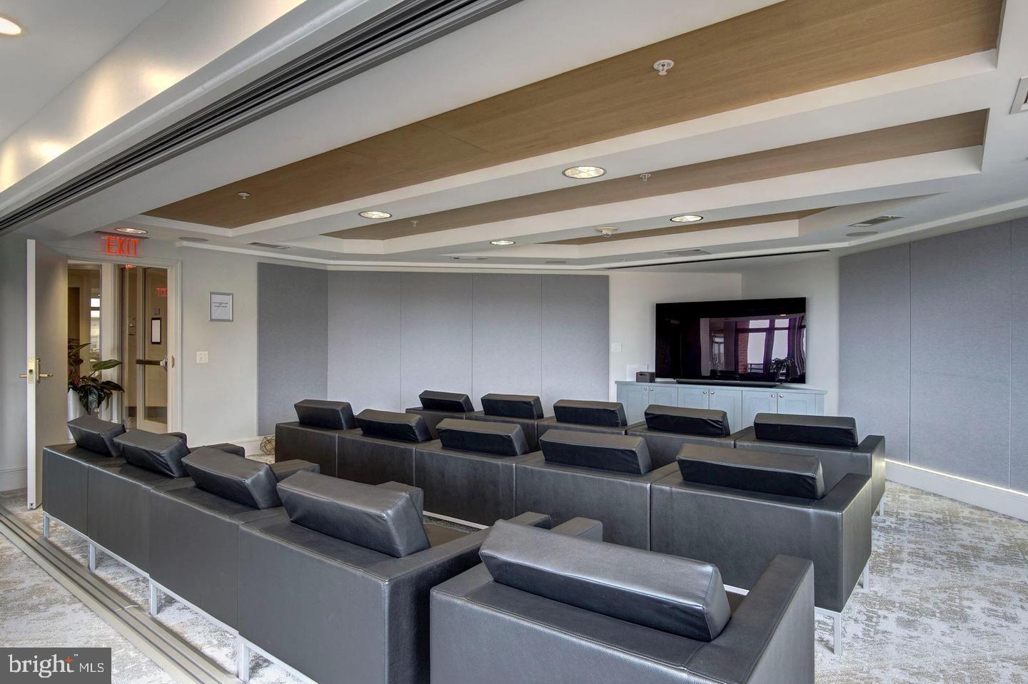 3650 South Glebe Road, Unit 662 Arlington, VA 22202 - Photo 45 of 63 a living room with furniture and a flat screen tv