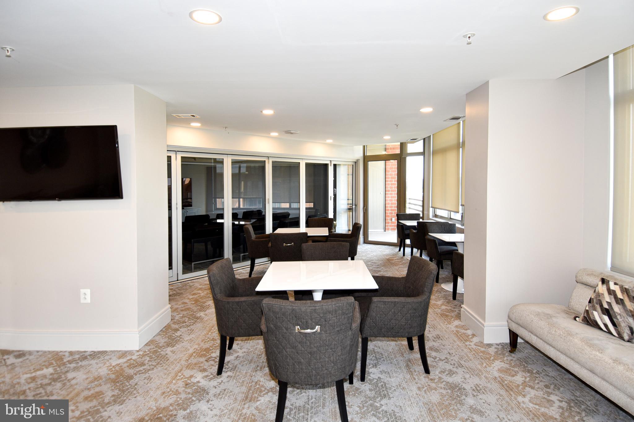3650 South Glebe Road, Unit 662 Arlington, VA 22202 - Photo 46 of 63 a large kitchen with a table and chairs