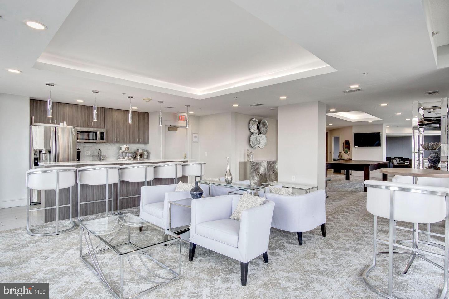 3650 South Glebe Road, Unit 662 Arlington, VA 22202 - Photo 48 of 63 a living room with furniture a view of kitchen and kitchen