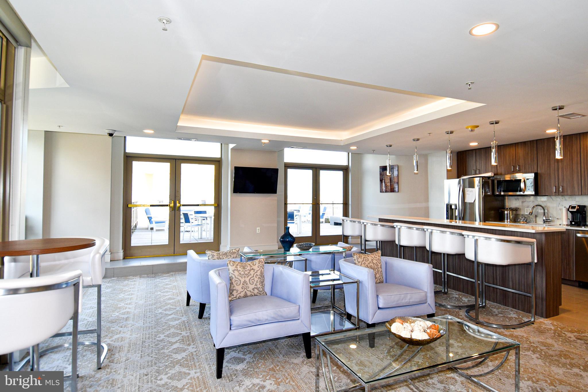 3650 South Glebe Road, Unit 662 Arlington, VA 22202 - Photo 49 of 63 a living room with furniture and a table
