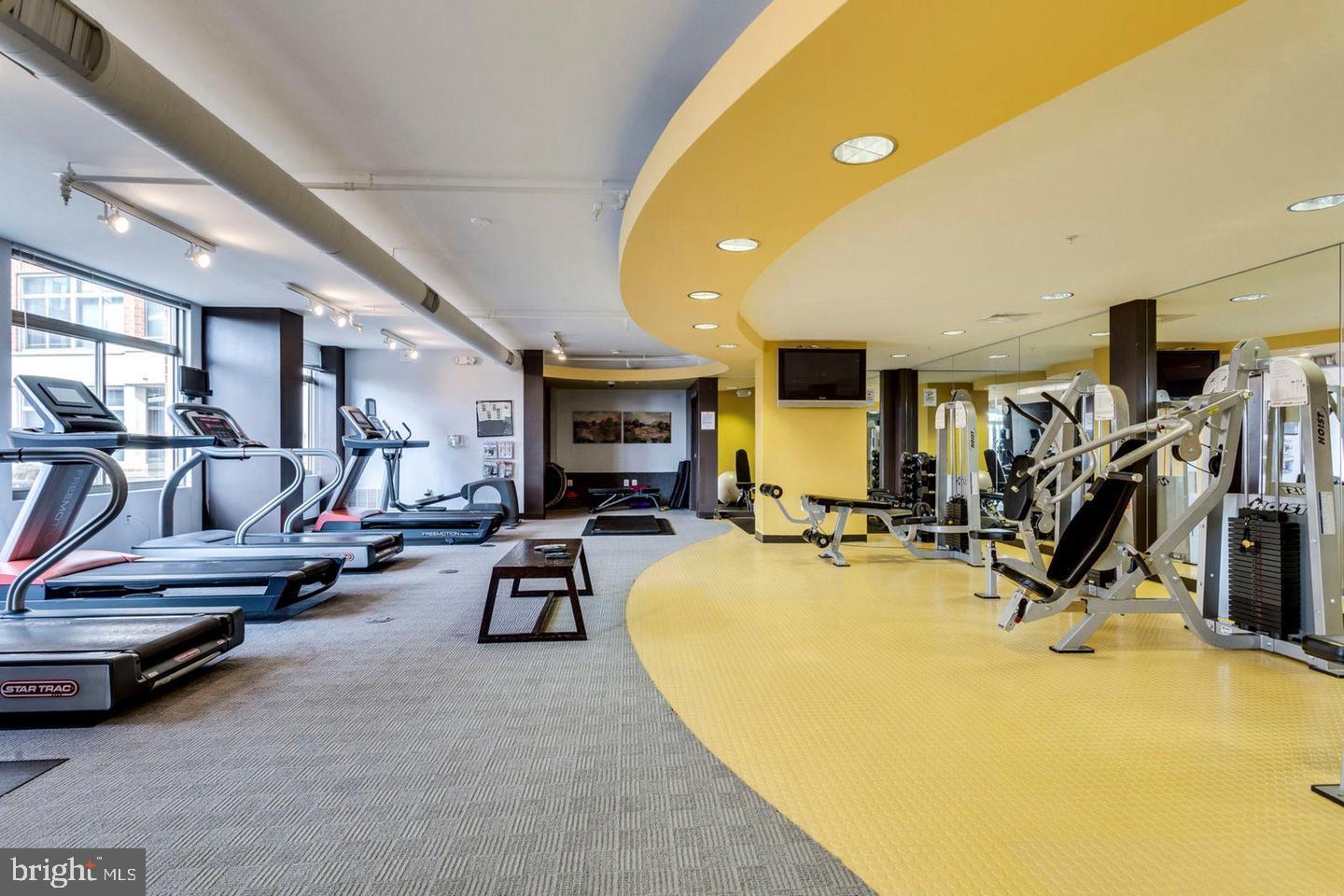 3650 South Glebe Road, Unit 662 Arlington, VA 22202 - Photo 54 of 63 a view of a room with gym equipment