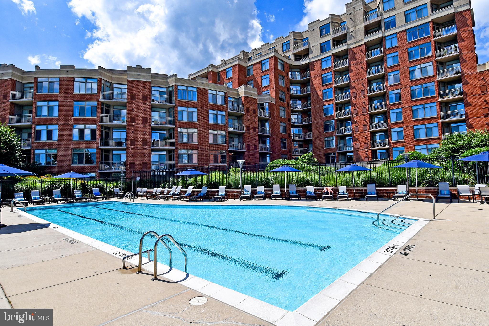 3650 South Glebe Road, Unit 662 Arlington, VA 22202 - Photo 57 of 63 a view of a building with a garden and sitting space
