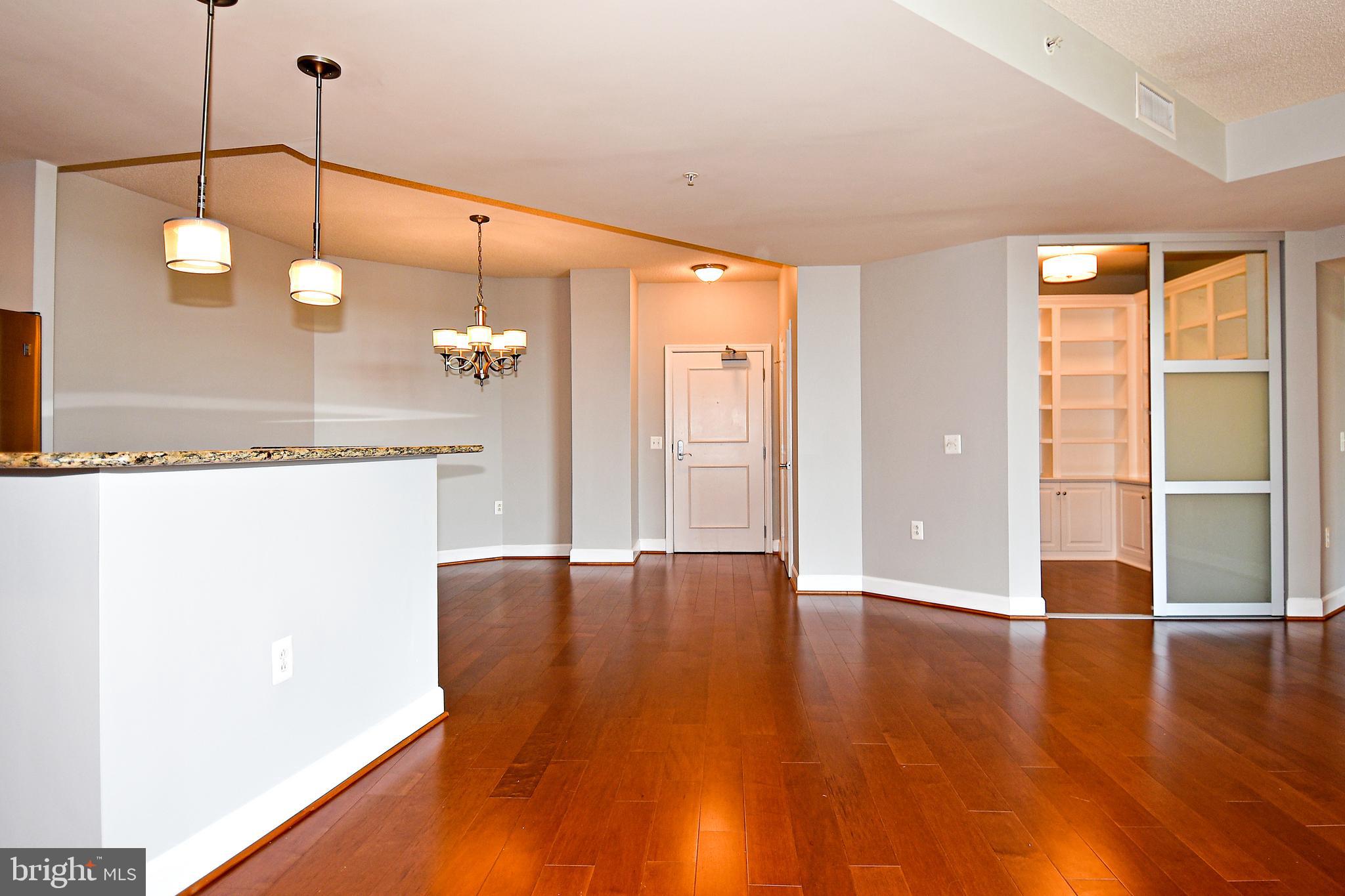 3650 South Glebe Road, Unit 662 Arlington, VA 22202 - Photo 9 of 63 a view of a room with wooden floor and window
