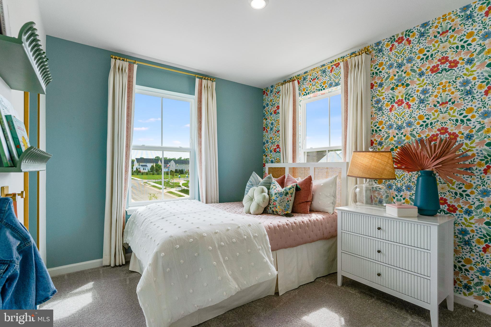 335 Sandy Btm Circle Ranson, WV 25438 - Photo 19 of 20 a bedroom with a bed dresser and a window