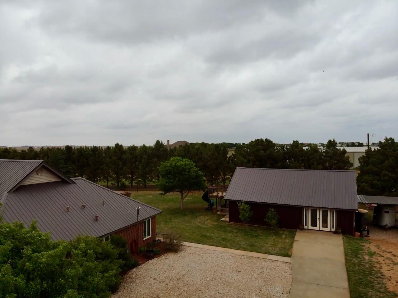 9002 Woodrow Road Wolfforth, TX 79382 - Photo 42 of 48 an aerial view of a house with pool table and chairs