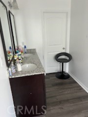 14255 Barolo Way Beaumont, CA 92223 - Photo 13 of 22 a bathroom with a sink and a mirror