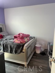 14255 Barolo Way Beaumont, CA 92223 - Photo 14 of 22 a bed room with a bed and a chair