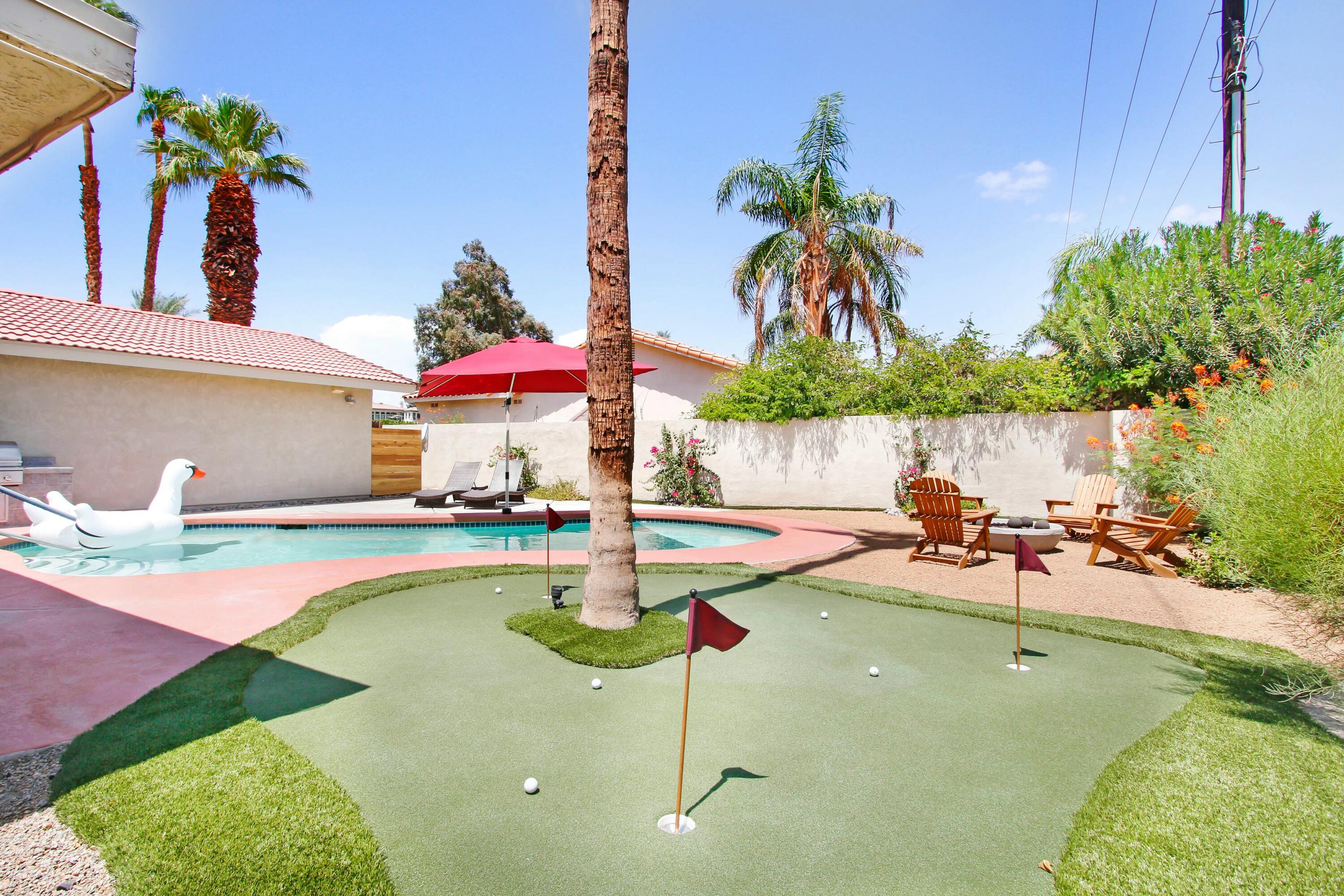 43480 Port Maria Road Bermuda Dunes, CA 92203 - Photo 21 of 24 a swimming pool with lawn chairs and plants