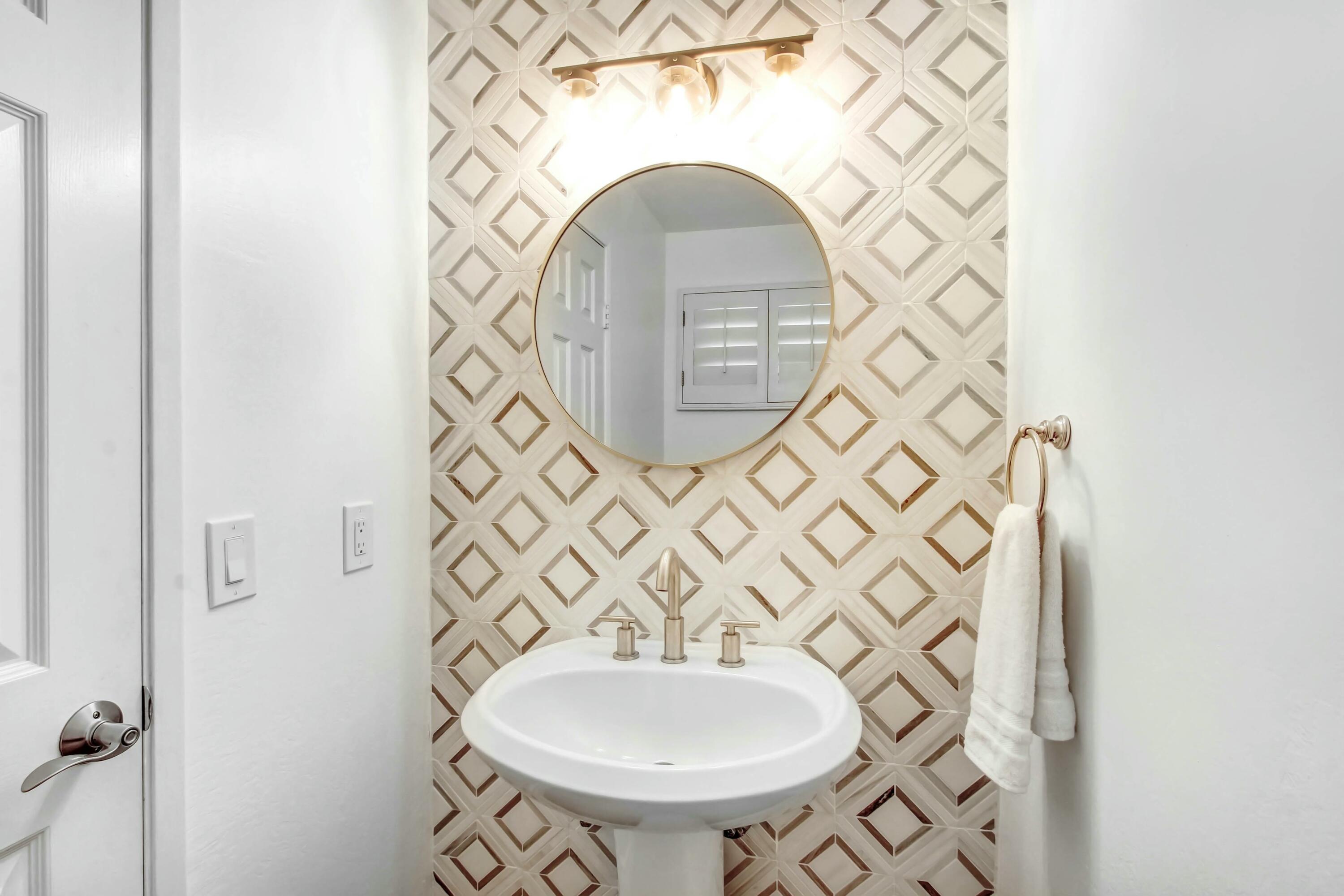 43480 Port Maria Road Bermuda Dunes, CA 92203 - Photo 24 of 24 a bathroom with a sink and a mirror