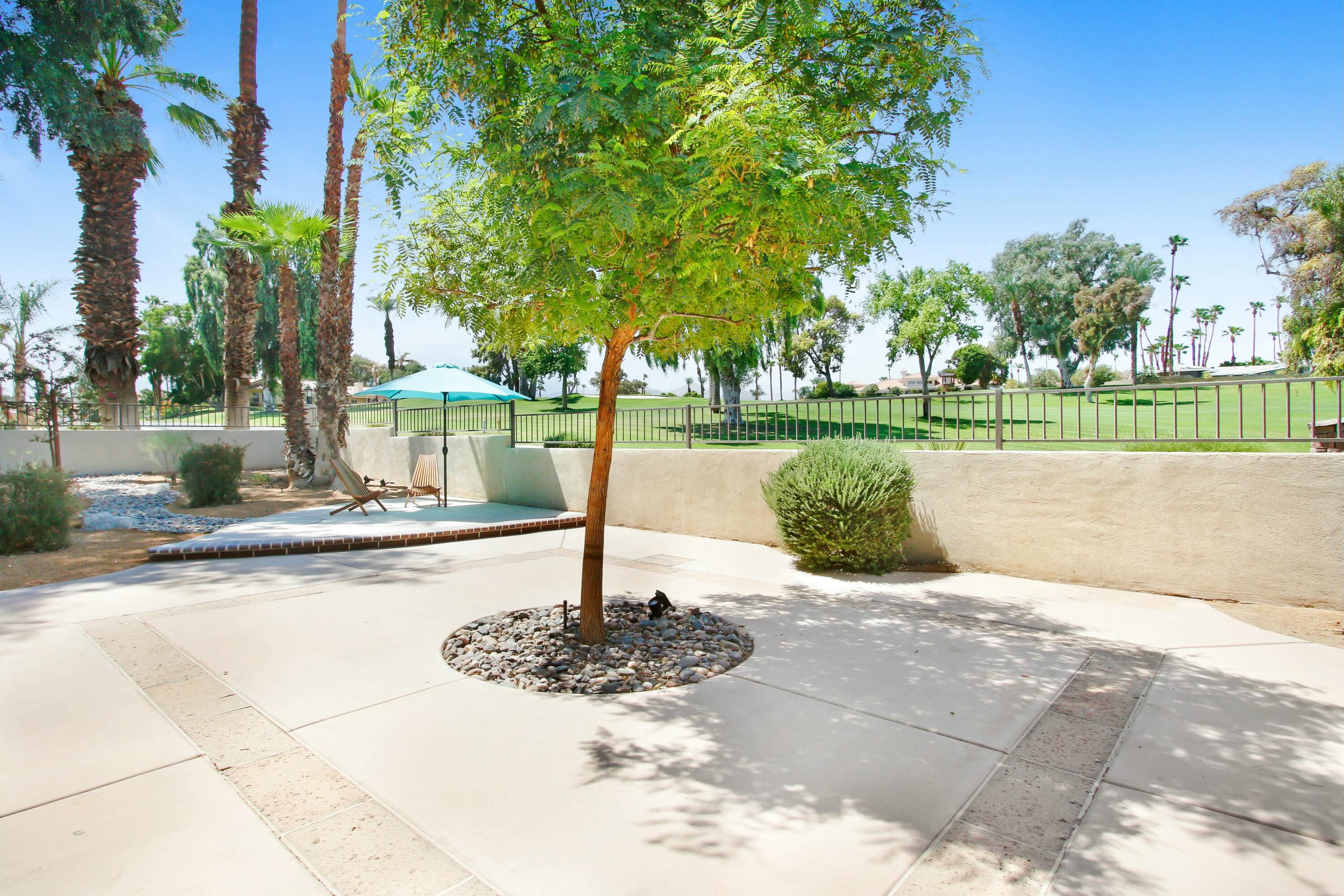 43480 Port Maria Road Bermuda Dunes, CA 92203 - Photo 4 of 24 a front view of a house with a yard
