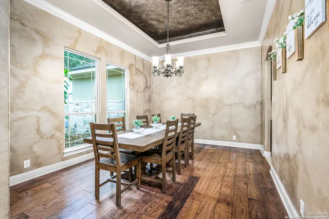 a workspace with furniture and a window