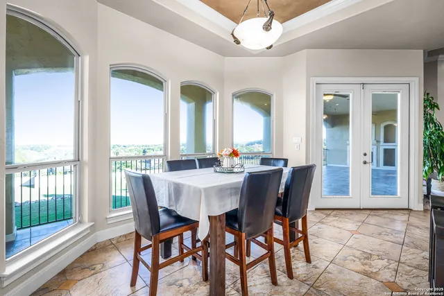 a spacious bedroom with a bed and a window