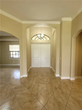 a view of an empty room and window