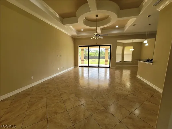 a view of an empty room with a fireplace