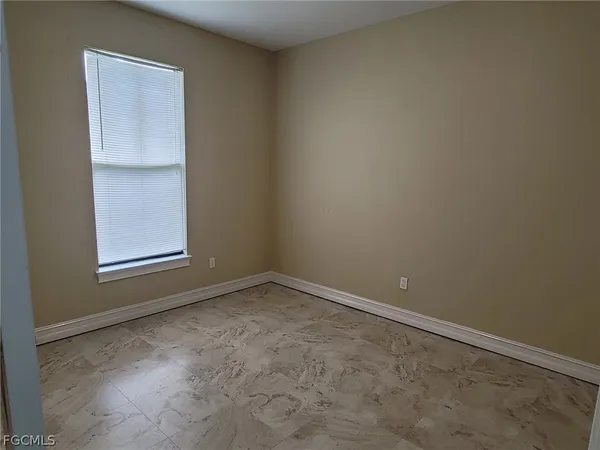 an empty room with a window