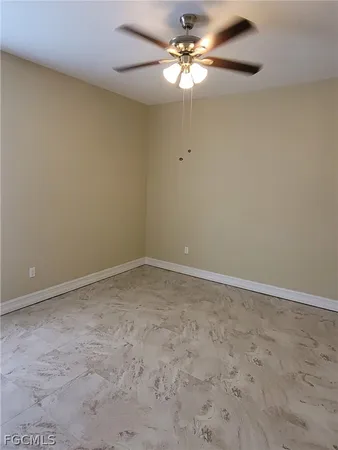 a view of a big room with carpet