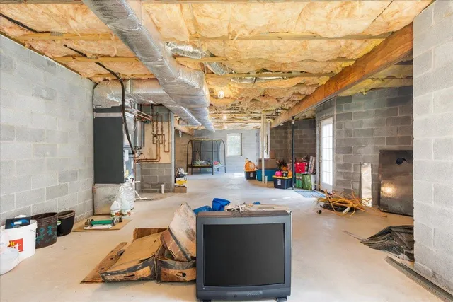 a view of a green field with lots of bushes