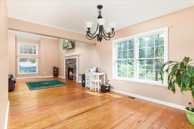 a kitchen with a stove a sink and a microwave