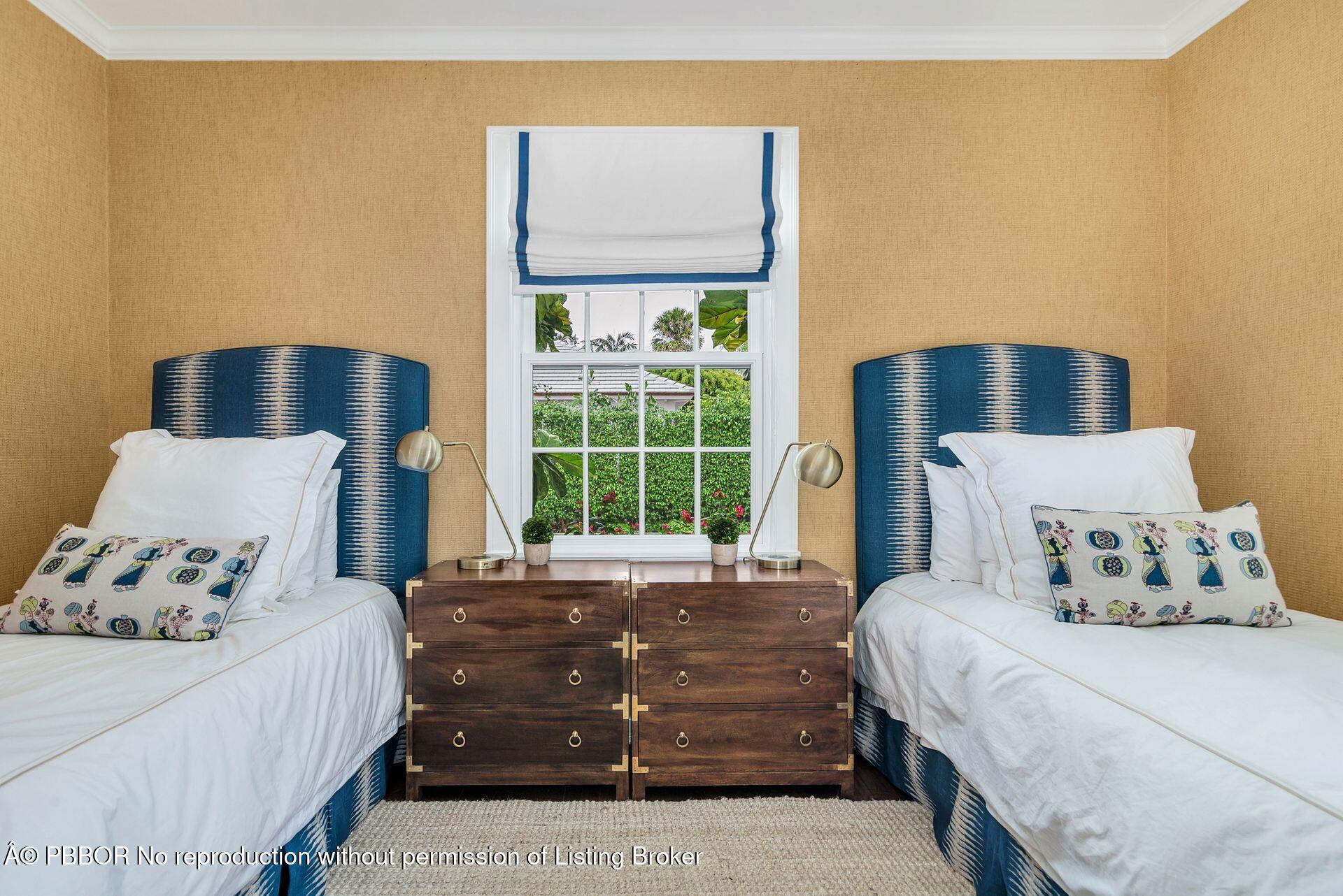 255 Colonial Lane Palm Beach, FL 33480 - Photo 17 of 32 a bedroom with a bed and a window