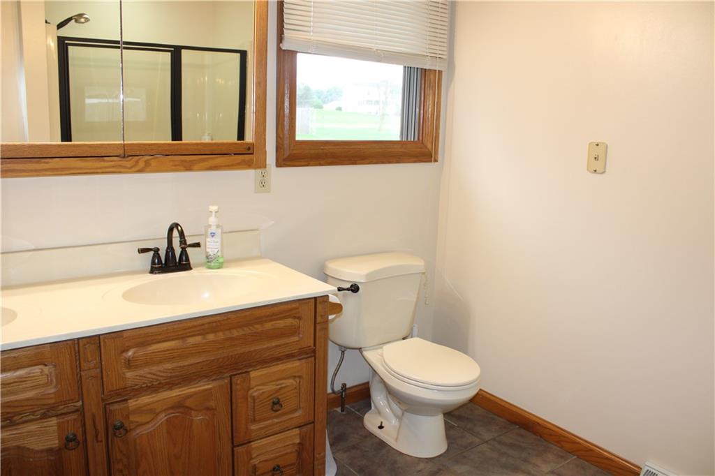 125 Shannon Road Renfrew, PA 16053 - Photo 21 of 39 a bathroom with a toilet sink and mirror