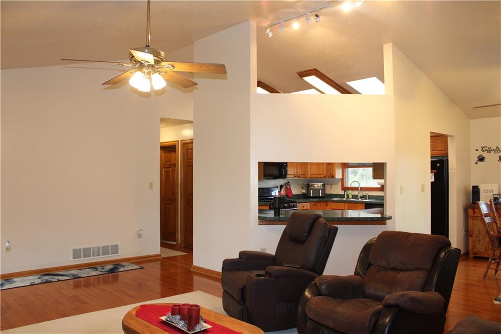 125 Shannon Road Renfrew, PA 16053 - Photo 7 of 39 a living room with furniture and a flat screen tv