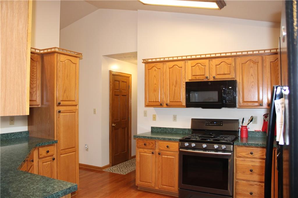 125 Shannon Road Renfrew, PA 16053 - Photo 8 of 39 a kitchen with stainless steel appliances a stove and a microwave