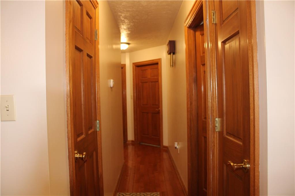 125 Shannon Road Renfrew, PA 16053 - Photo 10 of 39 a bathroom with a shower and a glass door