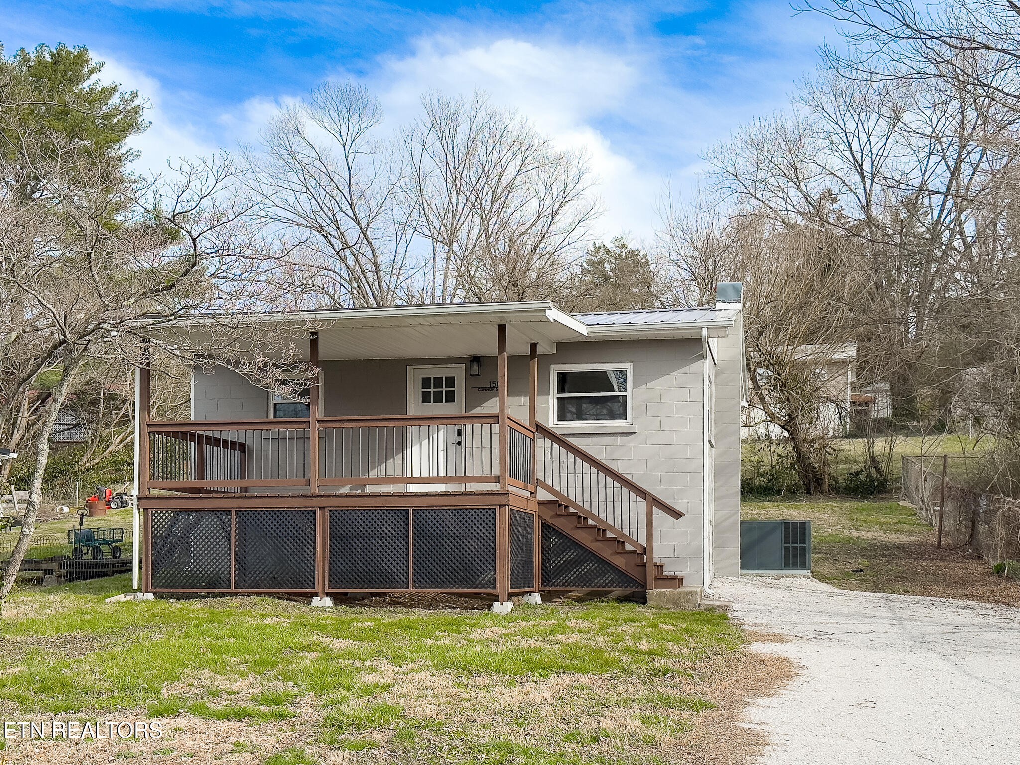 150 Connor Street Jacksboro, TN 37757 - Photo 1 of 22 a view of a house with a yard
