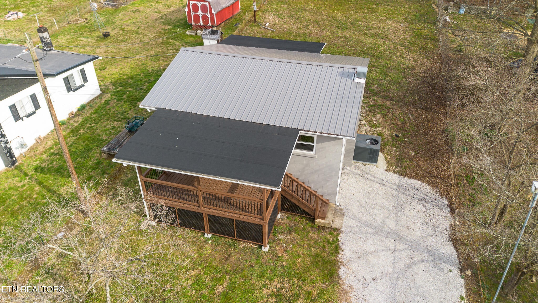 150 Connor Street Jacksboro, TN 37757 - Photo 17 of 22 a backyard of a house with lots of green space