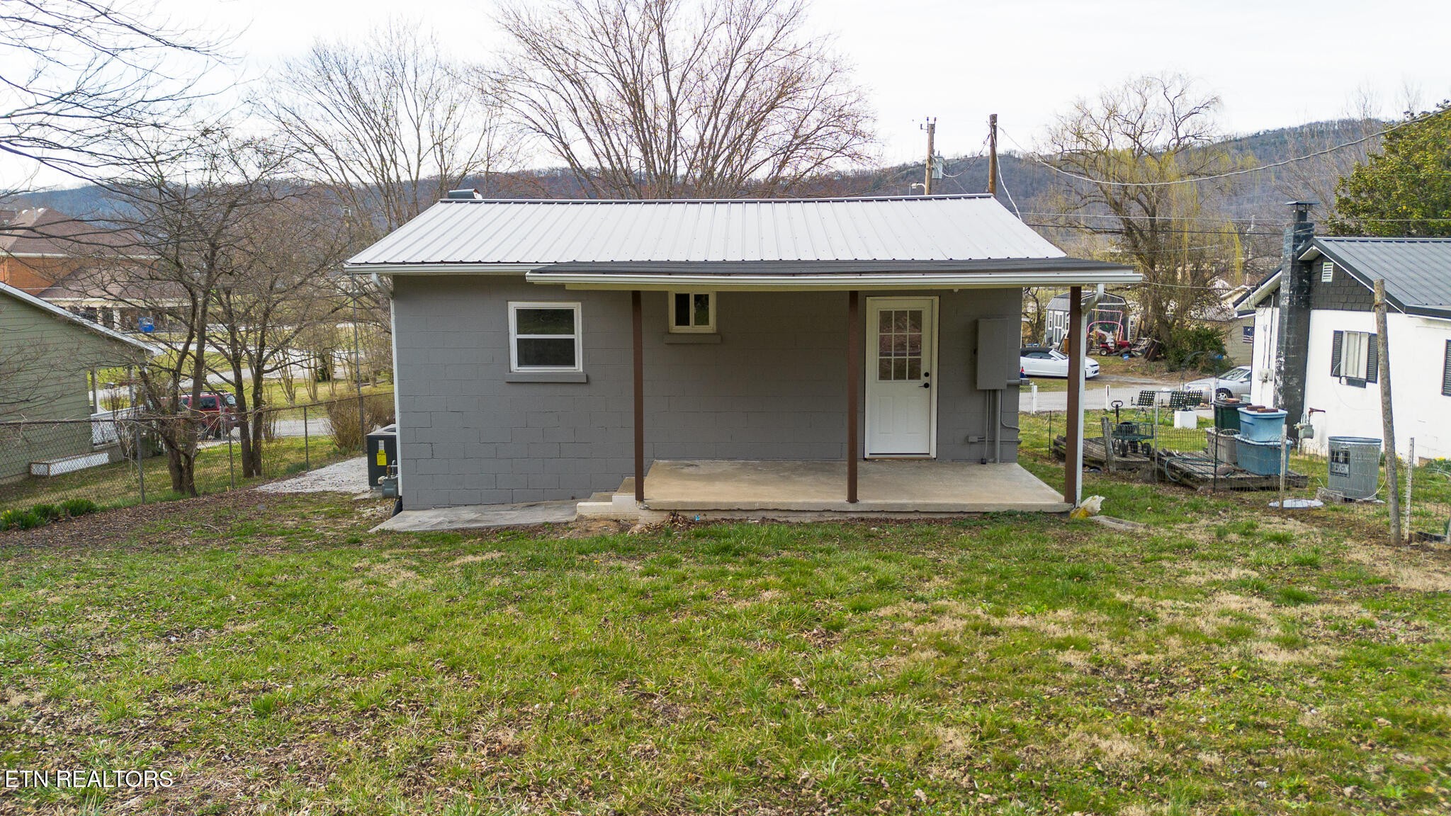 150 Connor Street Jacksboro, TN 37757 - Photo 19 of 22 a front view of a house with a yard