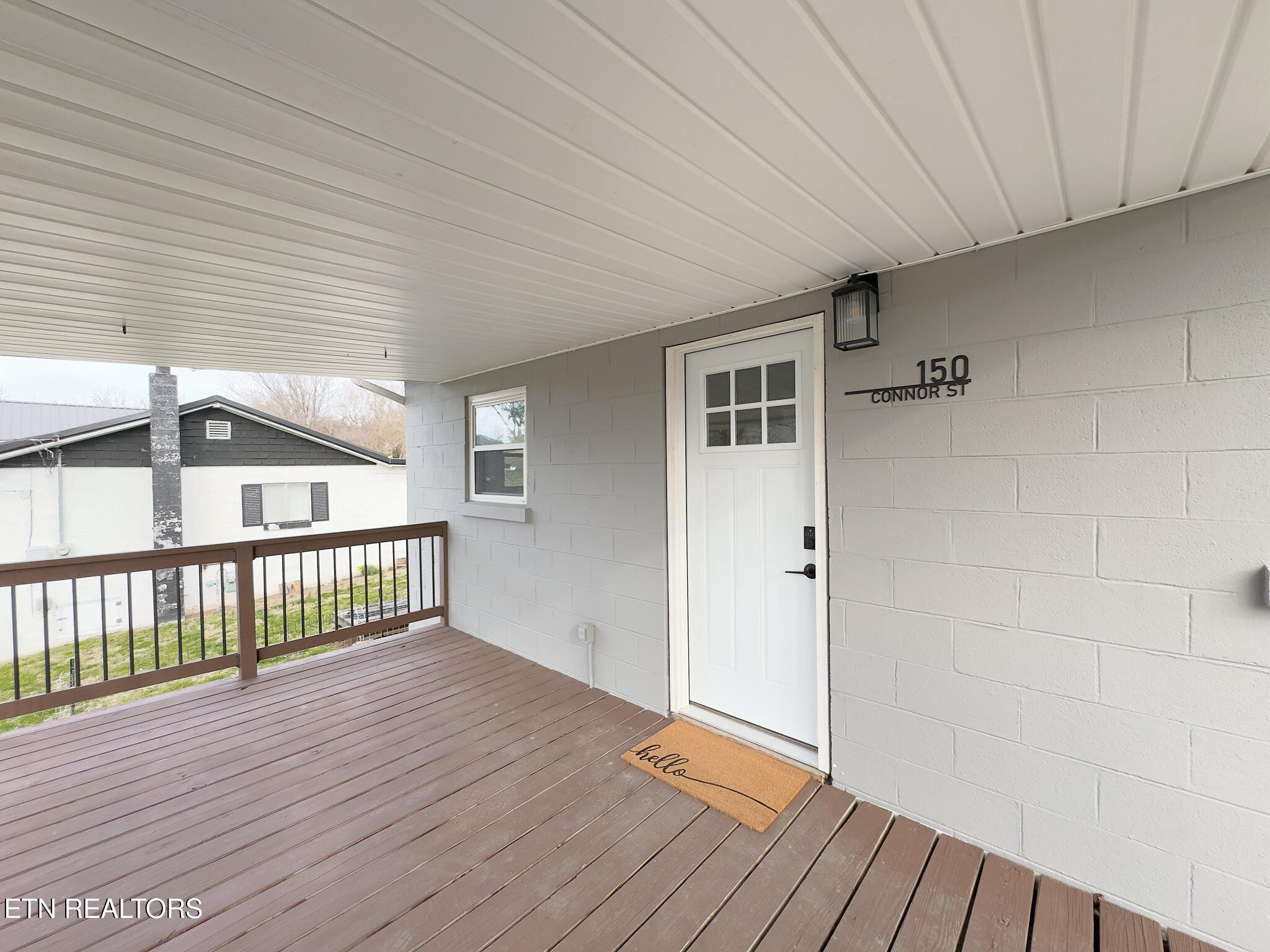 150 Connor Street Jacksboro, TN 37757 - Photo 2 of 22 a view of livingroom with deck and deck