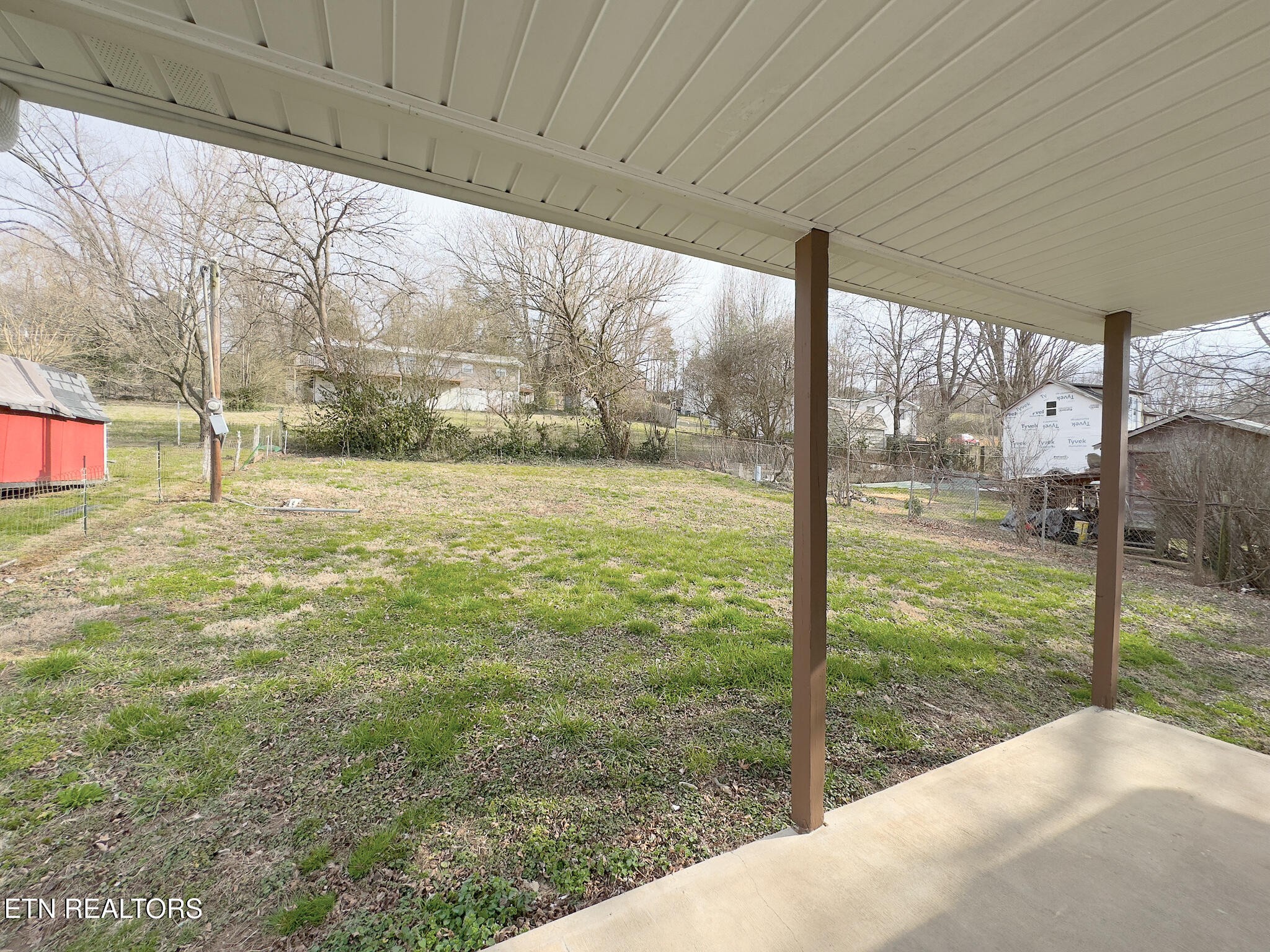 150 Connor Street Jacksboro, TN 37757 - Photo 22 of 22 a view of a porch with a yard