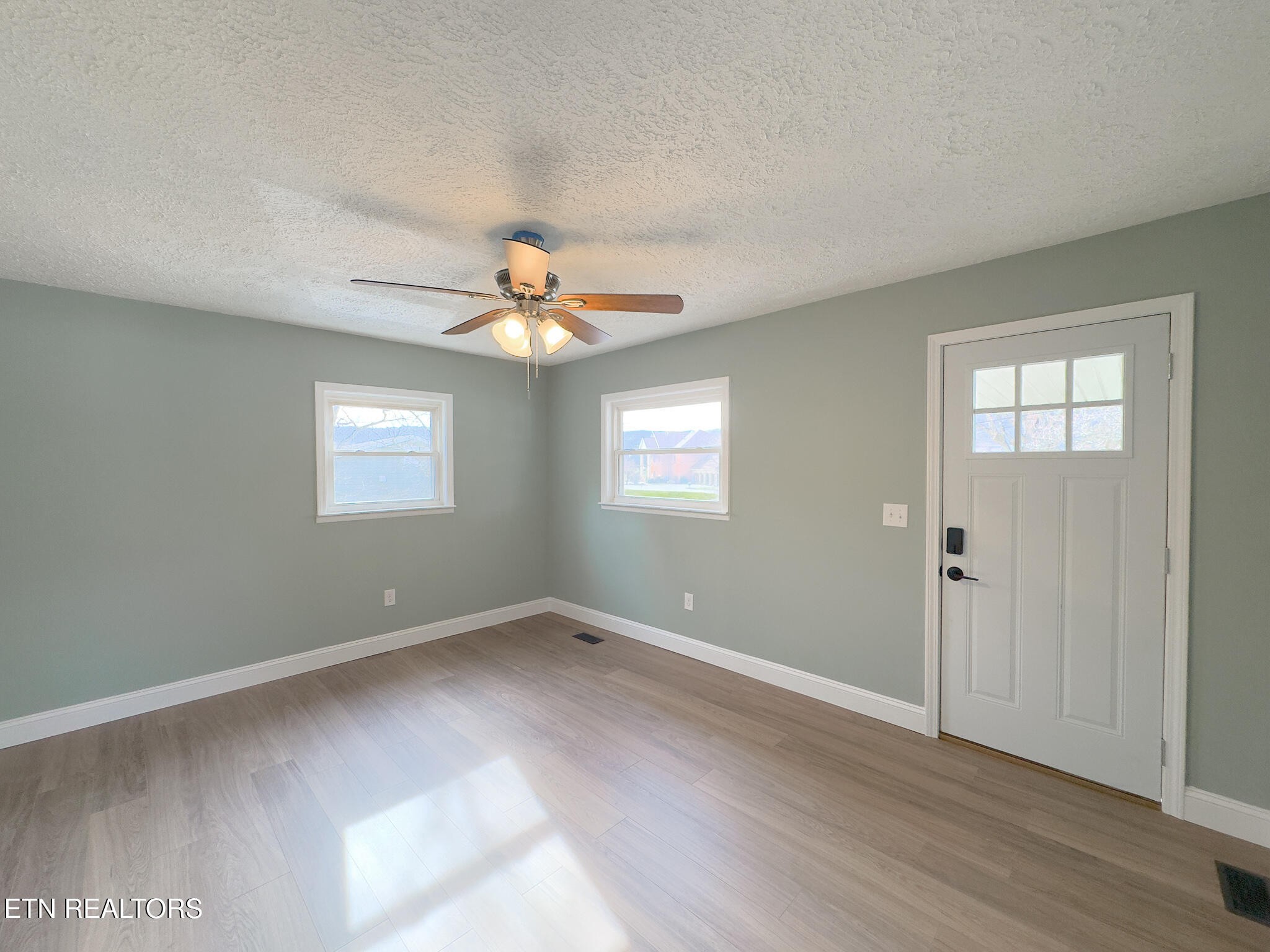 150 Connor Street Jacksboro, TN 37757 - Photo 3 of 22 a view of an empty room with a window