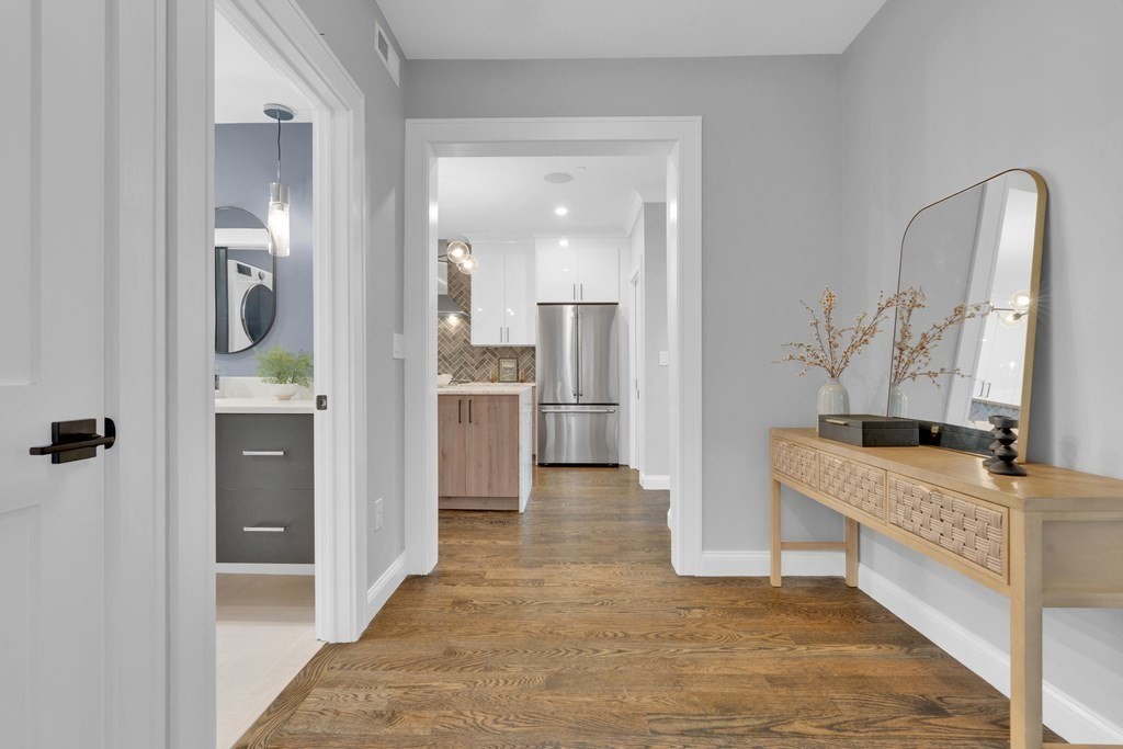 87 Parkton Road, Unit 2 Boston, MA 02130 - Photo 18 of 37 a view of a kitchen cabinets and a wooden floor