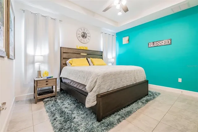 a bedroom with a bed and closet