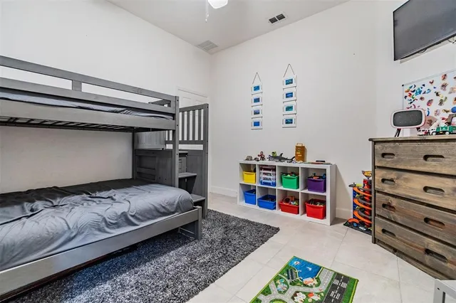 an aerial view of a house with a swimming pool