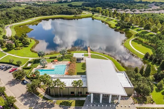 an aerial view of a house with a garden
