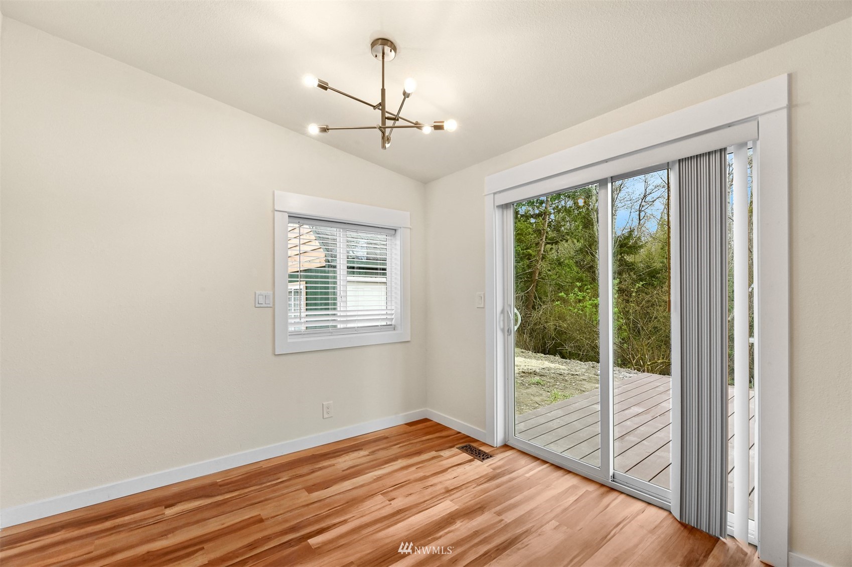 4423 Masterson Road Birch Bay, WA 98230 - Photo 11 of 20 a view of empty room with wooden floor and fan