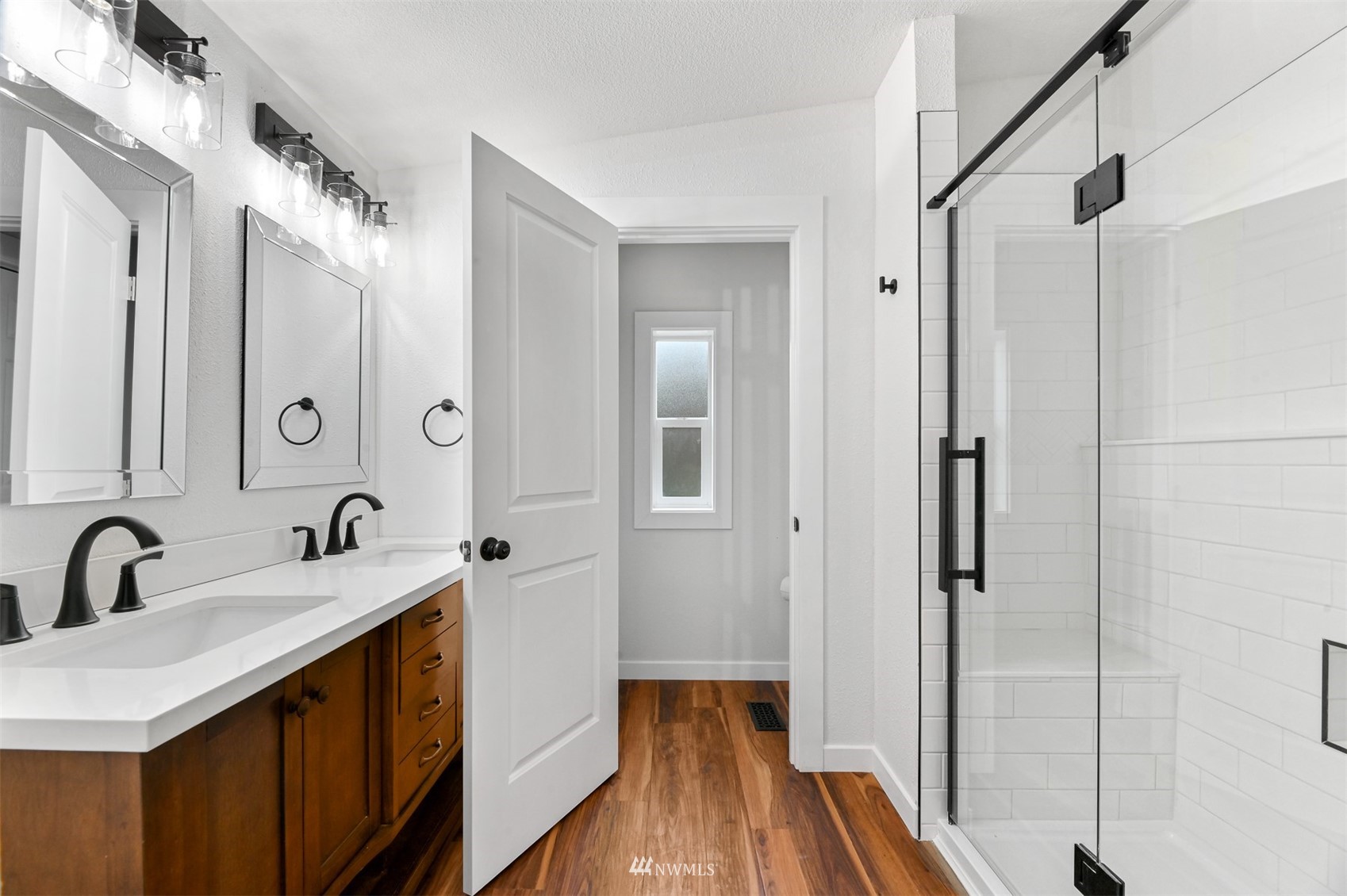 4423 Masterson Road Birch Bay, WA 98230 - Photo 13 of 20 a bathroom with a double vanity sink and mirror